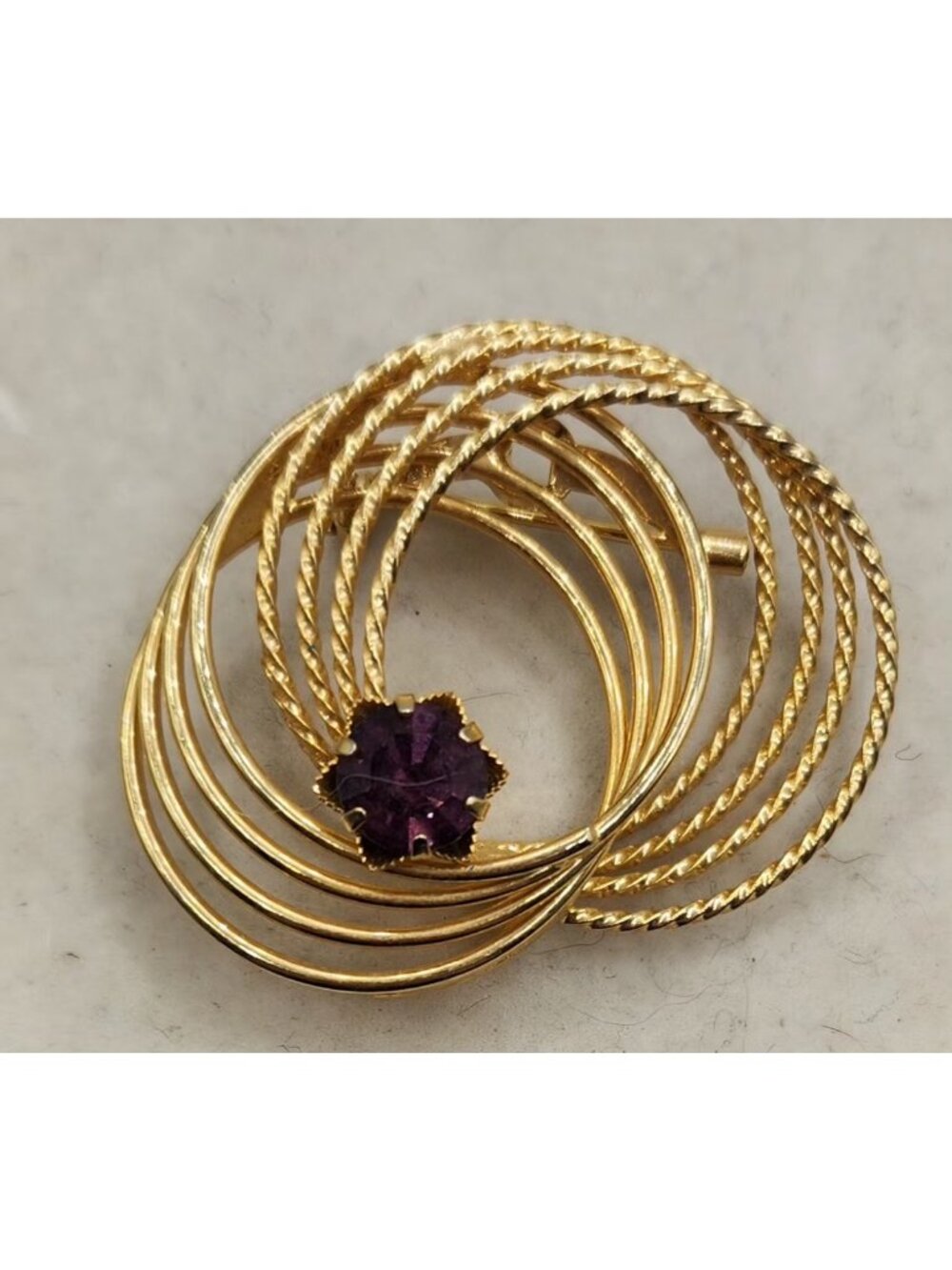 Multi Swirl Gold Tone Brooch With Purple Flower Shaped Rhinestone Accent